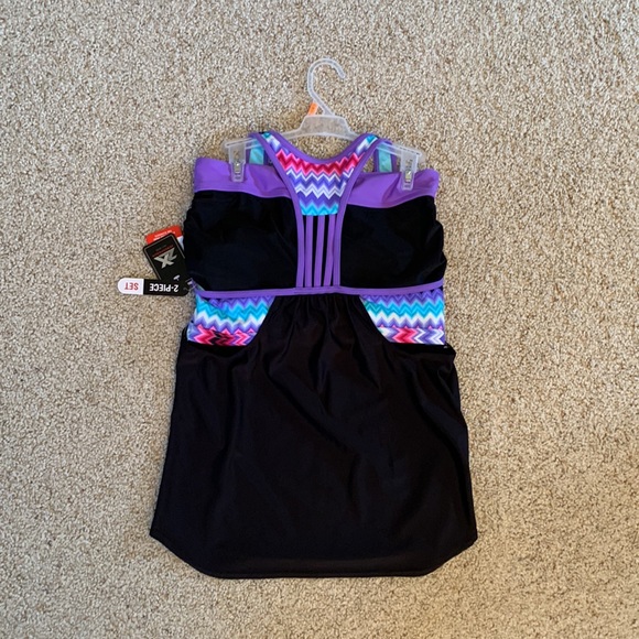 NWT - Zeroxposur Tankini/Shorts
2 pc Bathing Swim Suit
Black/Purple (Size 10) - Picture 5 of 6